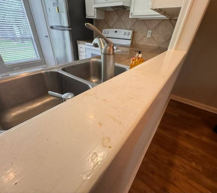 Breakfast bar & sink before cleaning